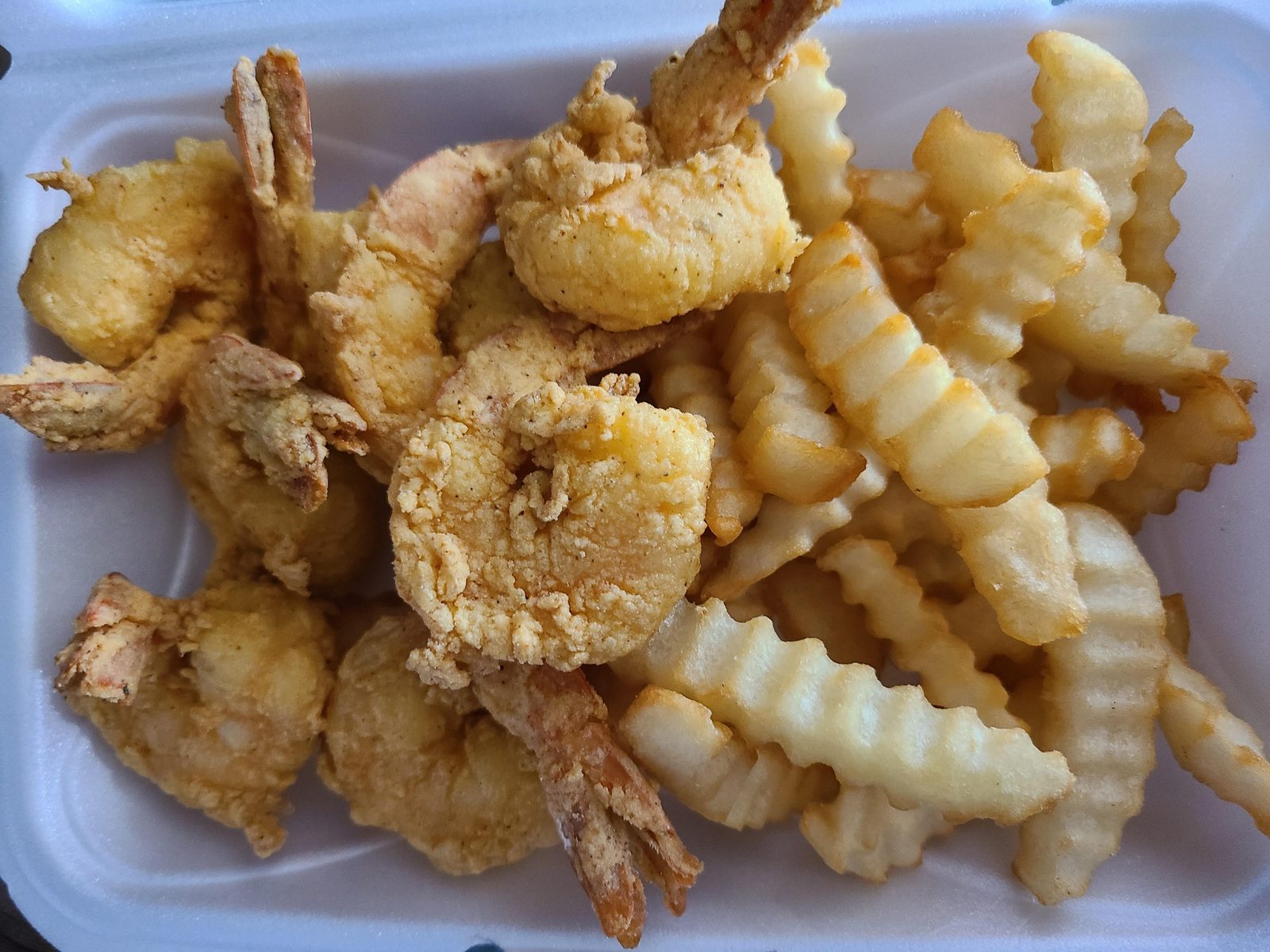 Fried shrimp and crinkle fries